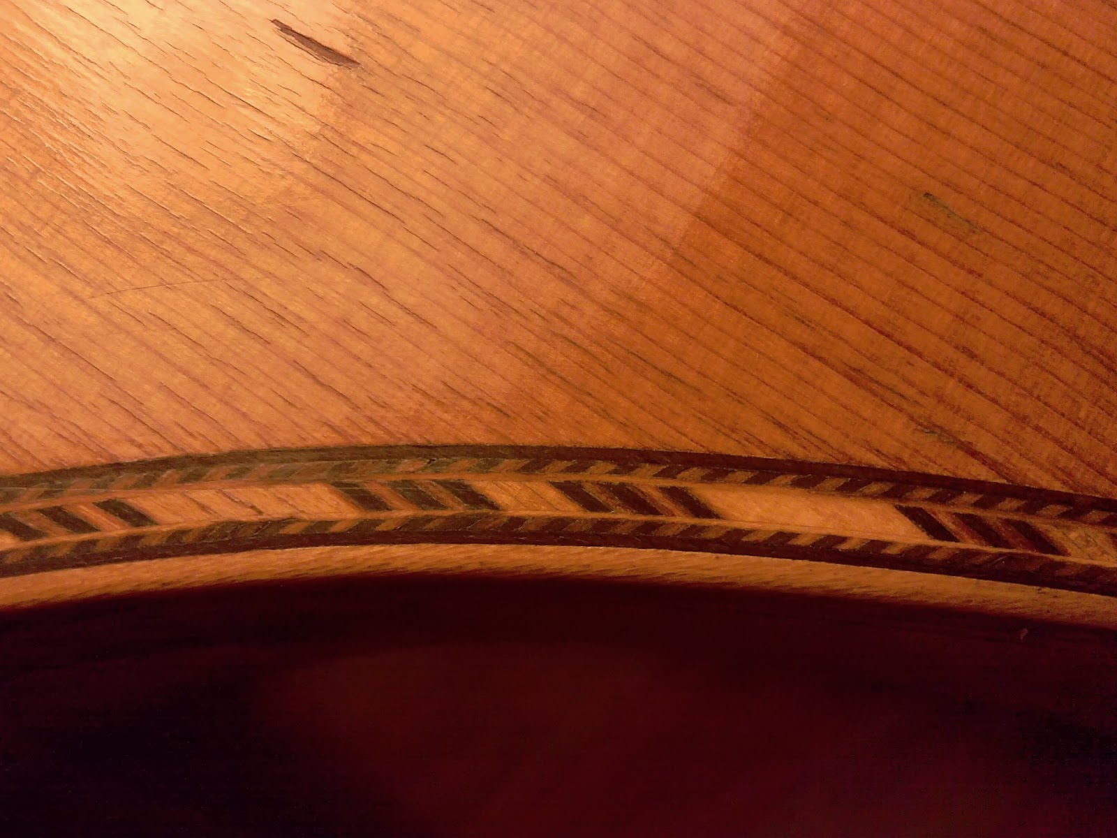 Classical guitar resting in soft light